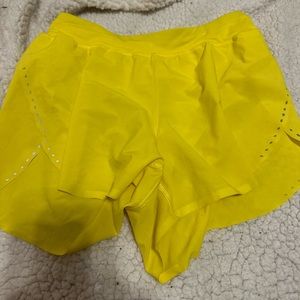 Size 4 Sonic yellow fast and free shorts 3”. Lululemon shorts.